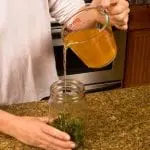 pour vinegar over your herbs to make an herbal vinegar