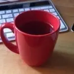 red mug of tea