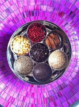 masala spices in metal daba