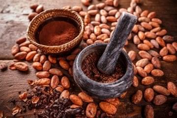 Cacao beans and mortar and pestal